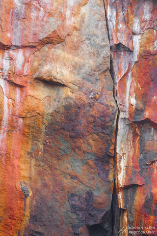 Colorful rock wall on the Oregon Coast