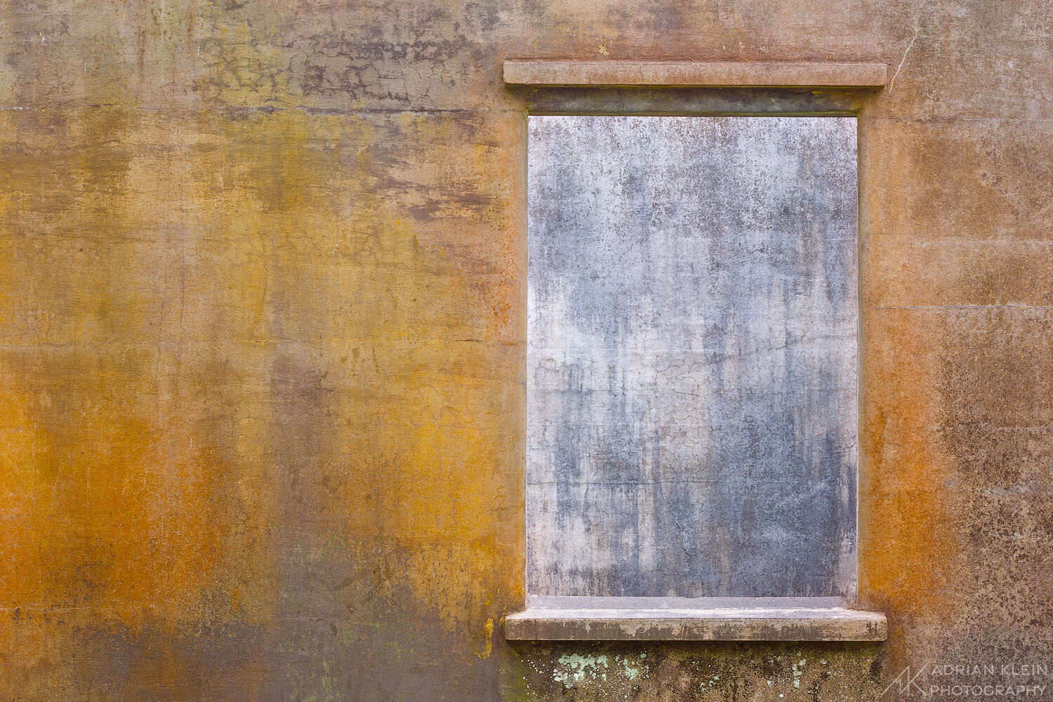 A concrete window to nowhere in an old abandoned house on the Oregon Coast.