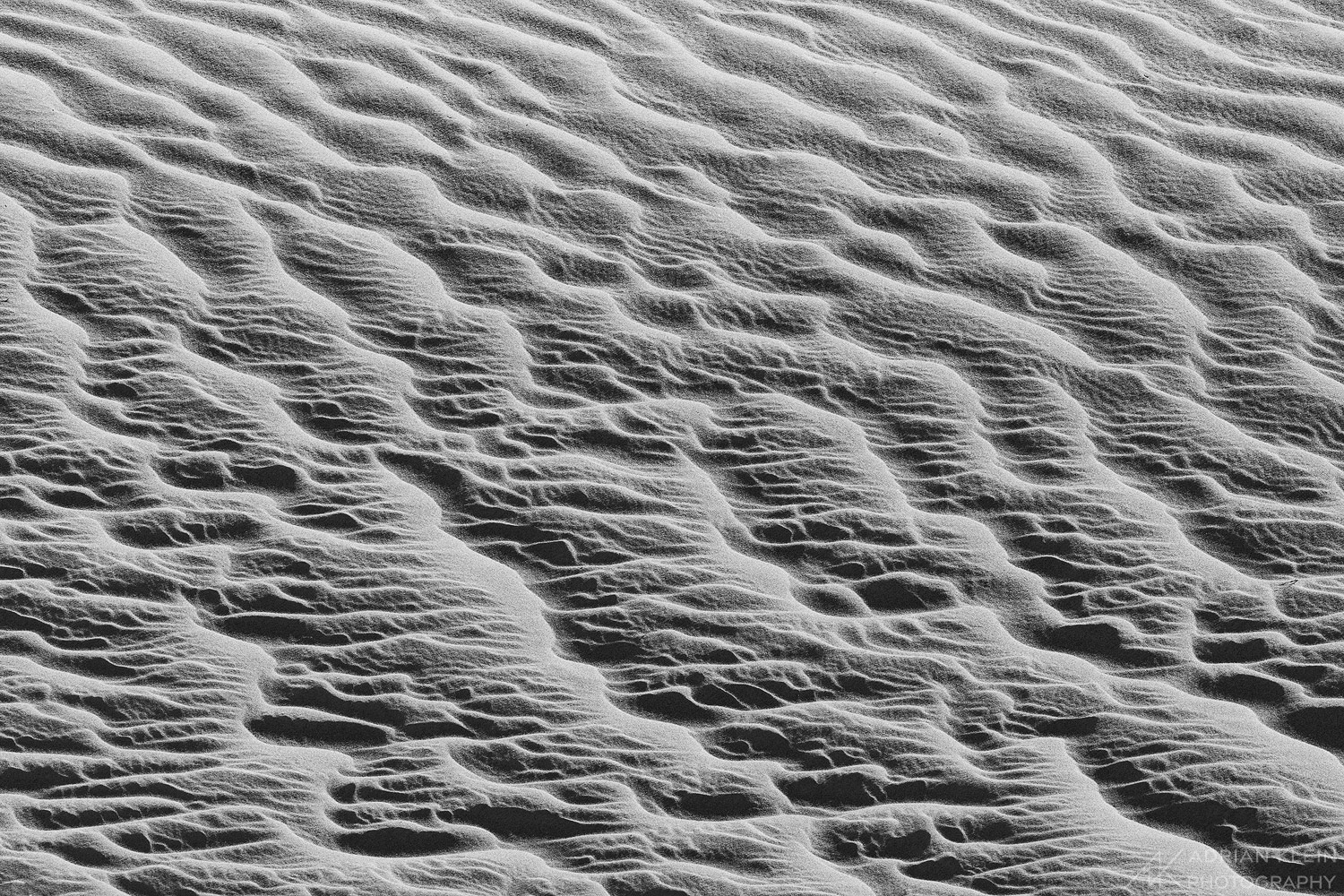 Abstract view of sand sculpted by the wind in Death Valley National Park, California