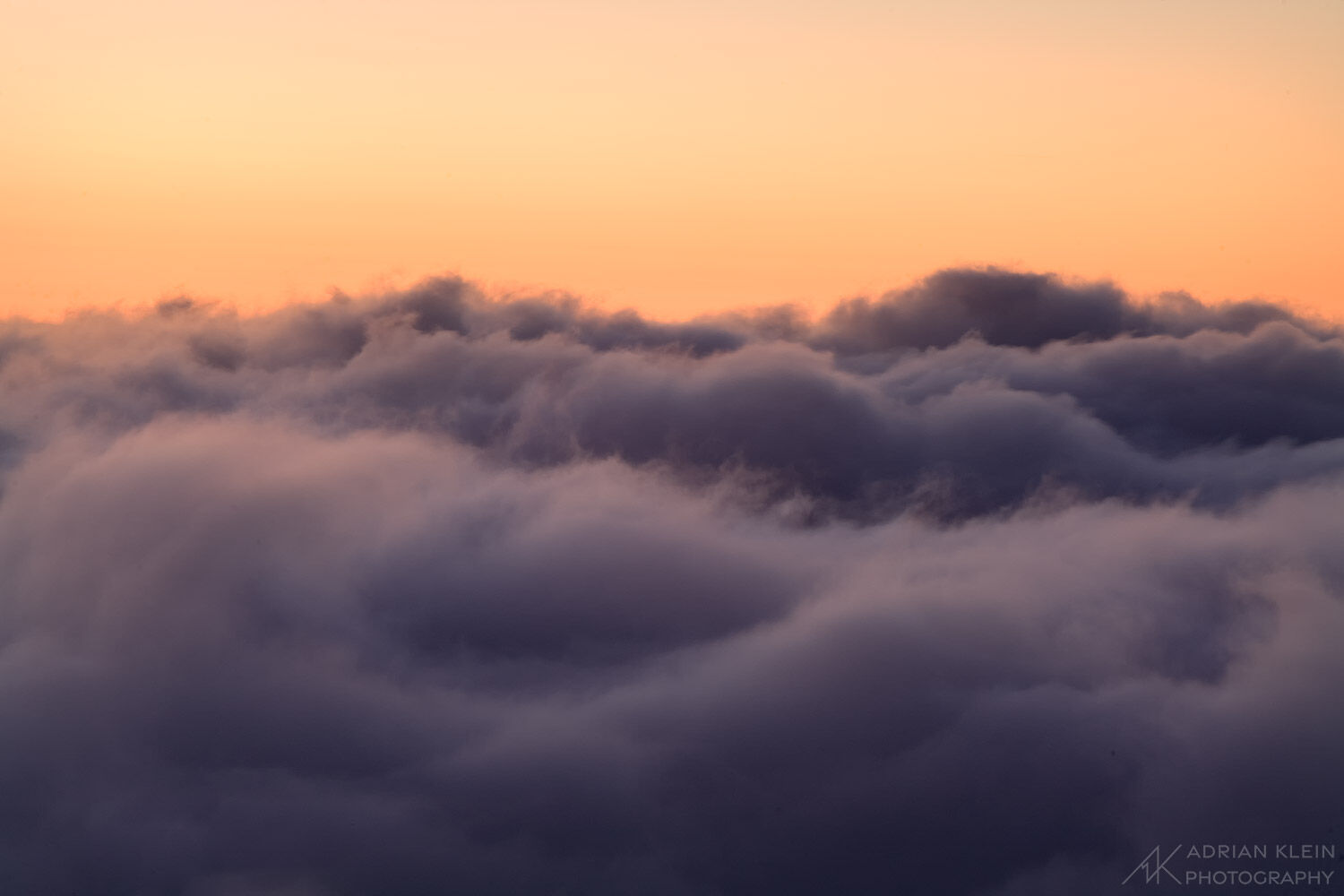 Thick clouds roll below me at sunrise on Mount Hood, Oregon.  Limited Edition of 50.