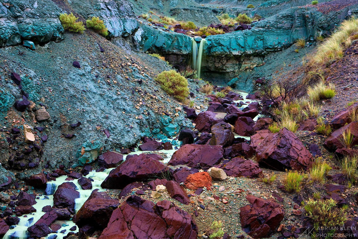 A stream of water flows through Blue Basin area of John Day National Monument in Oregon during a rainy day in spring. Limited...