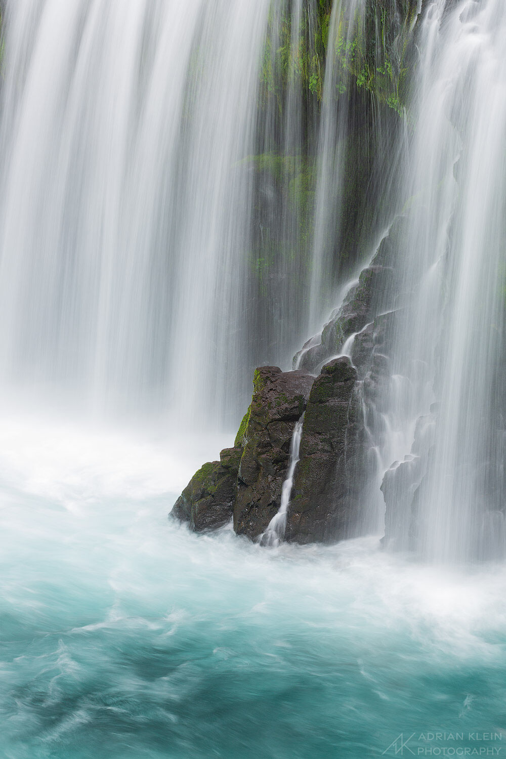 A turquoise waterfall in the pacific northwest runs high and fast during Spring time. Limited Edition of 50.